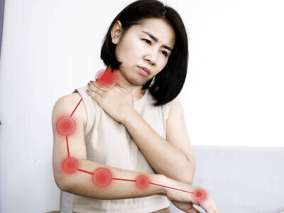 woman with radiating arm pain cervical Radiculopathy